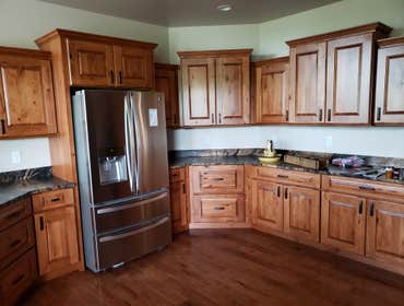 Photos by North Country Construction Inc #1 We built this gorgeous 5,000 SF house for a client in the powderhorn. It has a attached 3 car garage on a n