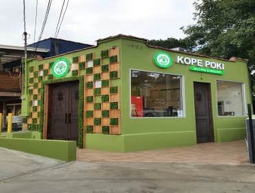 Exterior & Interior Buildout: Kope Poki, Los Angeles Designed to express a fresh and healthy concept, the project features a bold green exterior combin