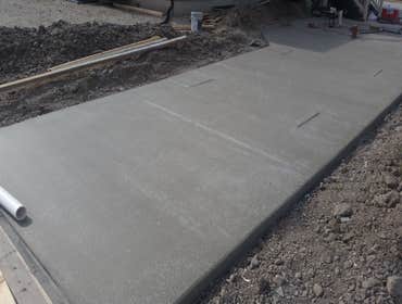 Concrete Driveway and Patio w/brick detail