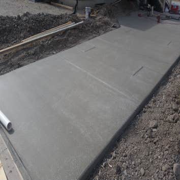 Concrete Driveway and Patio w/brick detail