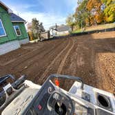 Photos by Madlandscape #3 200 yards of fielder in 200 yards of topsoil, graded out and slopped away from the house this project approximately took thre