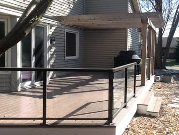 Photos by Custom Home Specialties Inc #2 Timber Tech maintenance free decks with powder coated railings.