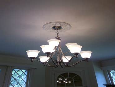 Lighting with medallion