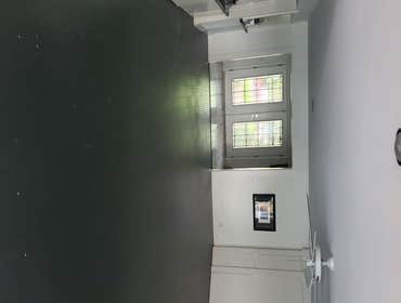 Raised Sunken Living Room with hardwood floor
