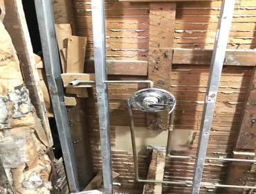 Photos by Proper Contracting Ny Inc #1 Remove old wood door and replace new metal door.