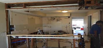 Wall Removal and Rerouting of elec. & vent