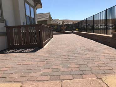 Photos by Cal Valley Landscape #13 Pavers paving, country manner retaining wall, AC unit railing cover around it