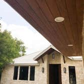 Recessed lights and fixtures added to entry of home