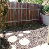 New home owner Installed complete irrigation system, bender board, seed, mulch, rock, fence and assorted flowers. We also planted trees on the upper em