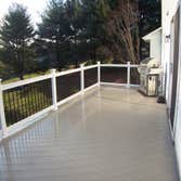 Photo(s) from American Deck Inc Gorilla decking- Kaki color with Round Paver Patio, Perry Hall, MD
