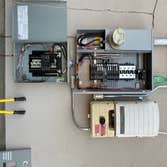 New Service upgrade with Solar ready 40 circuit panel, 200 amp metered Panel with amp125 amp sub- panel below and mounted solar inverter to roof panels