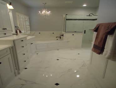 Project photos from Cadillac Tile Company L L C Here we have a good example of before[left side] and after photos, This is just a very small sample of 