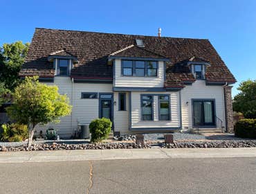 Auburn Re-Roof Remove old shake roof and install new asphalt shingles.