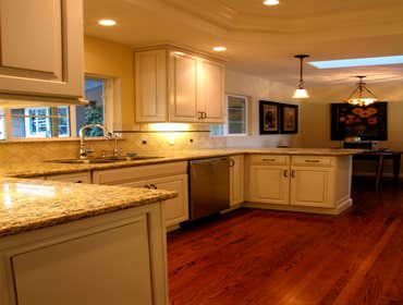 Photo(s) from Wagner Tile & Plumbing Kitchen-Dove White Cabinets, Granite Counters, Porcelain Tile Backsplash