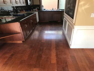 Photos by American Flooring Llc #4 We had to come, remove existing flooring because of tge water flood, prep the subfloor, cover the cabinets with mask