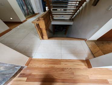 Photos by C&j All in One Property Solutions LLC #5 This new marble tile installation in the main hallway of the home was completed to enhance both the 