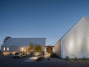 2 Barns Residence Located in the Uptown area of Phoenix, the residence is designed as a modern interpretation of 2 classic barn-like forms connected by