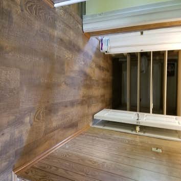 Vynl plank flooring Customer had a rental property that she was fixing-up due to water damage after the storm. We installed roughly over a thousand squ
