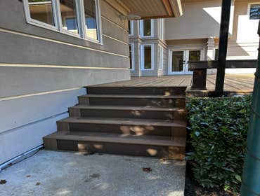Photos by Vertex Decks LLC #1 Another beautiful project features TimberTech composite decking with a picture frame perimeter, including steps. The addi