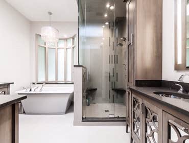 Lincoln Park Master Bath Remodel Demoed a 1980's style Master Bathroom on the 3rd floor of a single family home. The new Master Bath features Custom ha
