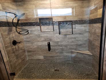 Photos by North Country Construction Inc #1 We built this gorgeous 5,000 SF house for a client in the powderhorn. It has a attached 3 car garage on a n