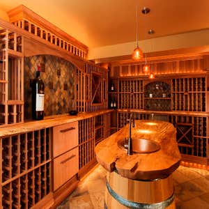 3 Barrel Island Wine Room A subterranean fitness room was chosen as an ideal location for a wine cellar. By modifying the structural support of the...