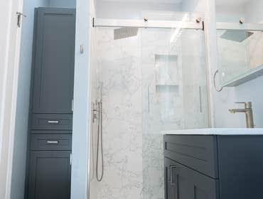 Berkeley Hill Bathroom Remodel Complete bathroom remodel. Shower has full length granite slabs.