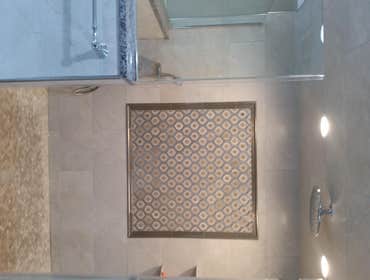 MASTER BATH #4 Make the shower a focal point with a beautiful mosaic arrangement on the long wall. Match it with the same mosaic as you walk in the ba