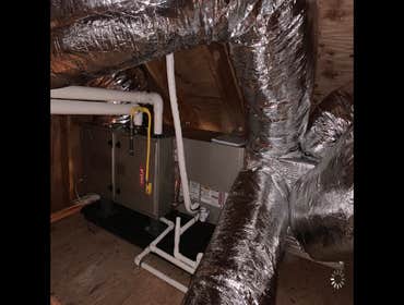 Photos by All Weather Heating and Air Conditioning Two complete HVAC systems including ducting, to be installed in two phases; pictures shown are from 