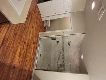 Bathroom Remodel Complete shower remodel, flooring install, glass door install, etc
