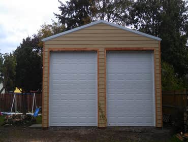Garage doors and openers installed