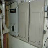 Transfer switch beside 2 panels