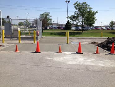 Concrete pad for fuel tank