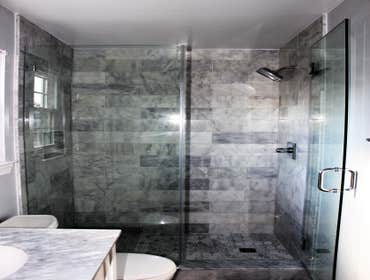 Beauty with function Bianca Carra marble bathroom with a focus on function.