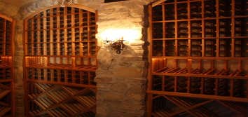 Project photos from Legacy Cellars Inc 4 custom arch wine cellars in grotto style wine room