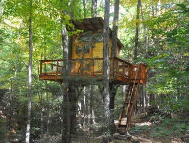 Photos by Muddy River Building Company LLC #7 A custom timber frame treehouse was constructed along side a river. The deck is 15" x 20', and the treeh