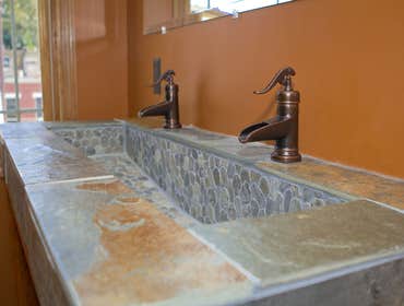 Stephen M Daniel Jr Construction Project 1 Custom built and designed bathroom sink, Adjacent shower, and Kitchen. These were all done in a 100 + yr old