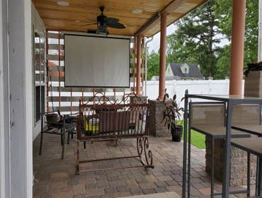 Photos by Trinity Remodeling LLC #10 Back Porch and Roof with lighting and media