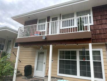 Kolman Deck Project Deck Build with updated posts and wrapped with structural aluminum from WestBury Structure Posts. Composite by Timbertech Products 