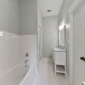 Historic-Style New Construction New construction in Old Mandeville. Home is historic Acadian style with modern floor plan.