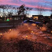Photos by Rosenberg Landscaping, LLC #1 Our client wanted a xeriscape oasis, so we relocated or removed existing high-water use plants, laid down a wee