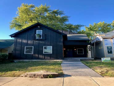 Sherfick Companies build 404 E Minnesota Indy Demo, gut and rebuild. 2 story room addition. 2 car garage. Concert patios and sidewalk.