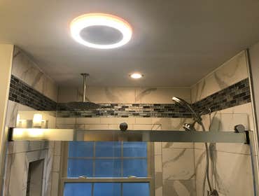 Photos by Unbeatable Electric #1 Complete bathroom remodel. Installed radiant floor heat, blue tooth speaker system with night light and regular light.