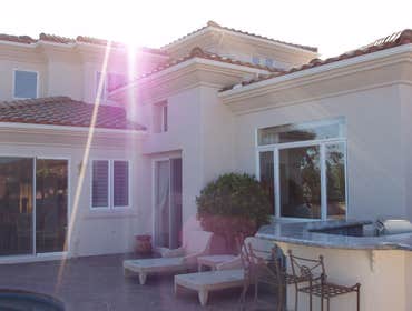 Chris Matthews Painting Project Exterior painting of two-story home and exterior wall fence, staining of deck, stairways and doors. San Diego, CA