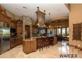 Photos by Sequoia Homes LLC #1 This Tuscan/Mediterranean style home is truly one of Mohave County's finest luxury homes. Over 1 acre of property in the
