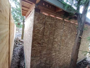 Photos by Stewart & Son Gate & Fence LLC #1 Tiny House with pergola. Small house 17' by 12' small bathroom with pocket door, and small sink with water 