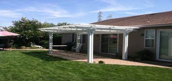 Duralum Patio Cover DURALUM performs like real wood can't and
unlike real wood, DURALUM shade structures
will not burn, attract termites, crack, peel