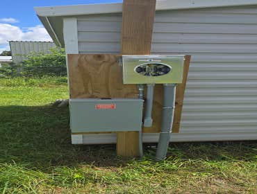 Permanent power pole for client sheds