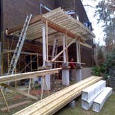 Lyndee Construction, Inc Large home addition This family in Raleigh, NC had grown out of their home. They had invested greatly in the landscaping of t