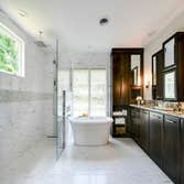 Downtown Spa Master Bath Retreat Complete transformation from dated master bath and den to a spa inspired oasis including spacious walk in closet.